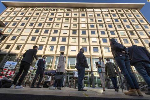 Journalists outside the court building in Koblenz, Germany where two former Syrian intelligence officers are on trial, 23 April 2020 (Thomas Lohnes/AFP via Getty Images)